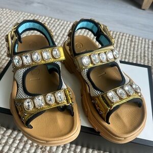 Gucci Aguru gold sandals
